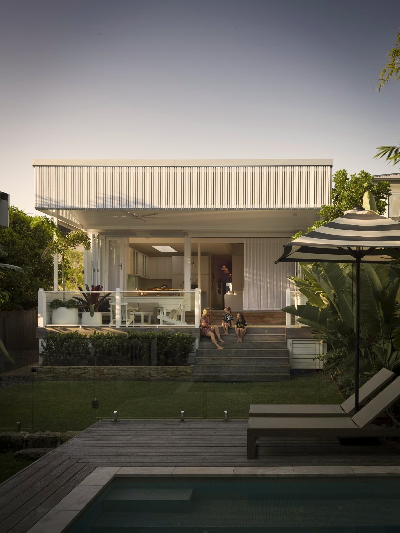 Rear elevation with pool and outdoor lounges