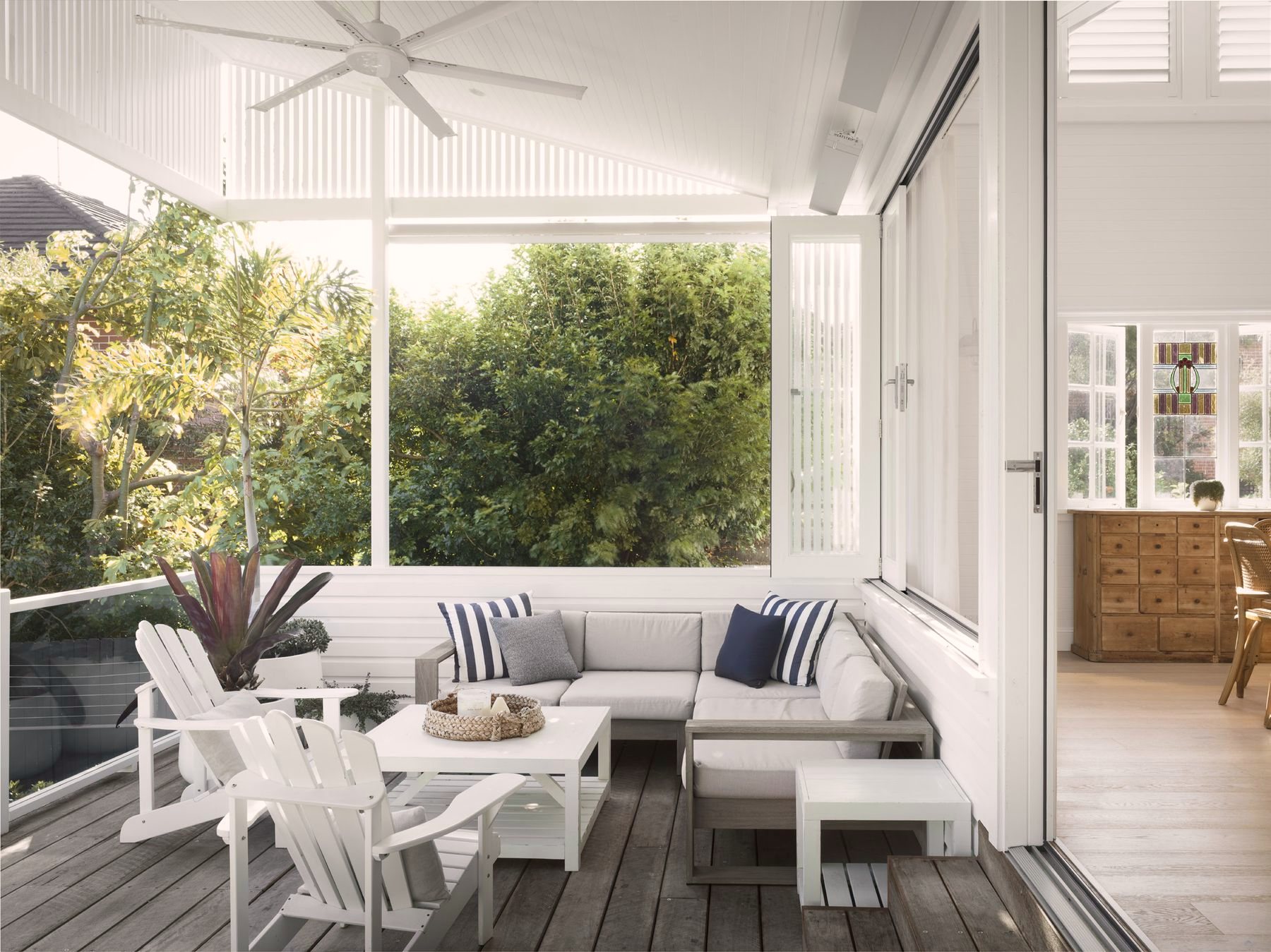 Covered outdoor room with built-in seating